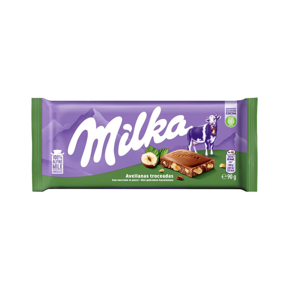 Tablete de chocolate Milka de avelã de 90g, com sabor cremoso e ingredientes de mercearia, em embalagem com marca Milka.